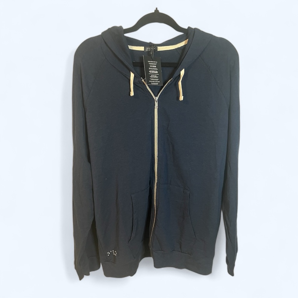 A Navy blue zippered hoodie by Two Blind Brothers in size large